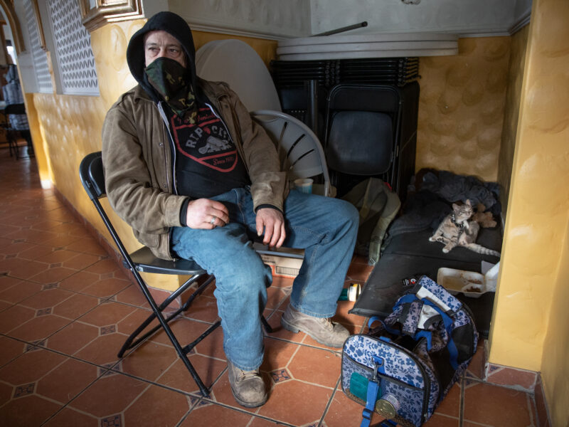 Homeless individual with pet