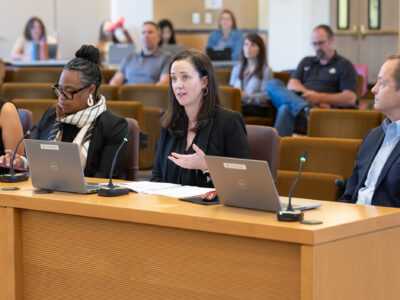 Joint Office leadership sits at dais in Multnomah County boardroom